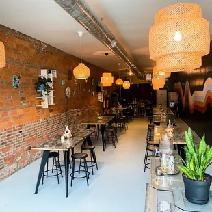 Our studio seats up to 36 guests at 8 long tables.