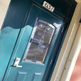 Find the teal colored door and you've almost found Studio Bella Rouge!