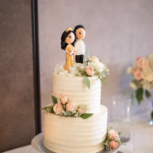 Two tiered ribbon textured buttercream cake