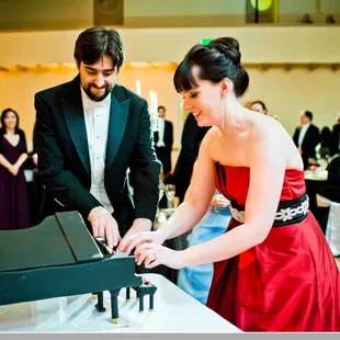 Playing the piano cake (hubby and I are both pianists).