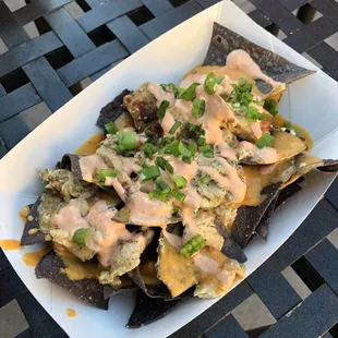 Loaded chicken nachos! At 7.49 one of the better deals in the park