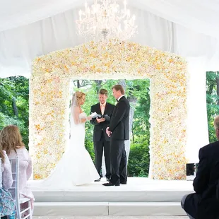 Custom made of over 1000 white roses for an arbor