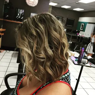 The textured LOB "long Bob" is what is in! Stylist Ashleigh has this cut and style down!