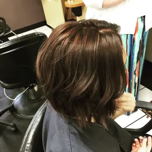 stylist Kelsey took her client from grown out bleach blonde to this amazing chocolate bob!!