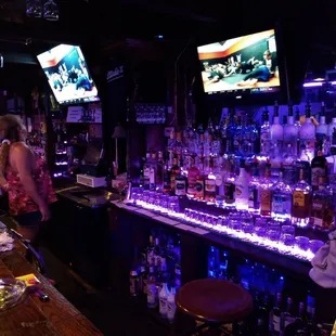 a bar with a television in the background