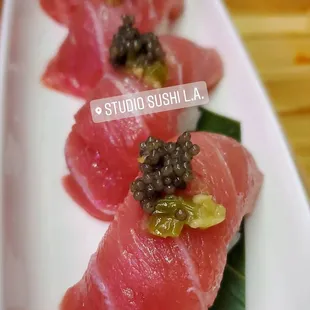 Toro sushi with caviar and fresh wasabi