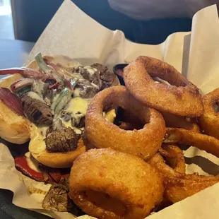 Beefy Steak sandwich with onion rings