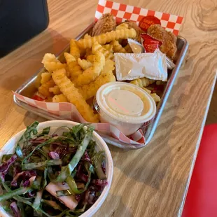 3 wing seafood boudin wing combo with collard green coleslaw