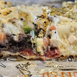 Close up of the Mixed Meat combo (left) and the Zaatar Cheese combo plus chicken (right). I preferred the Zaatar.