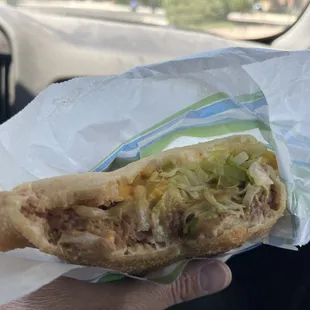 Stufy's.  Stuffed sopapilla, #9.  Refried beans, green chile, ground beef, cheese and lettuce.