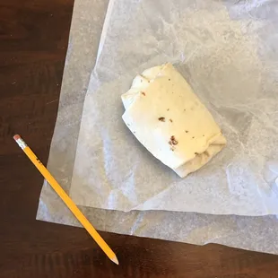This was the sausage burrito that I was given after a 15 minute wait. Seriously?!