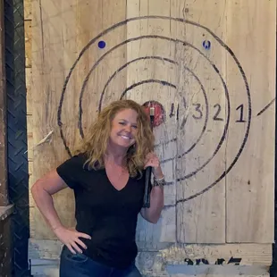 a woman standing in front of a target