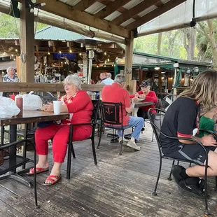 Outside dining, bar in the background