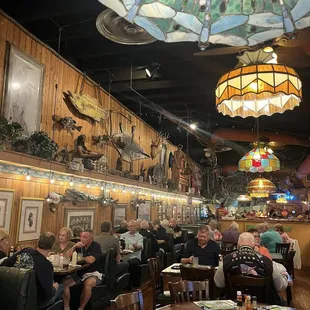 a dining room with a large chandelier