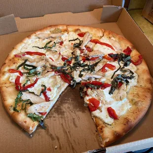 a whole pizza in a box