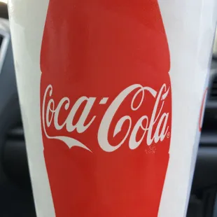 a closeup of a coca cola bottle