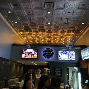 people sitting at the bar