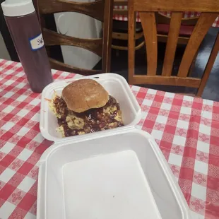 2 gunz special! Beans, slaw, nacho cheese, pulled pork, pickles, BBQ sauce.