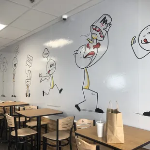 a drawing on the wall of a restaurant