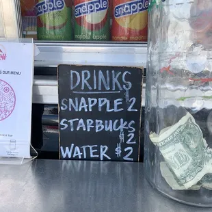 a sign that says drink snaffle 2 starbucks water 2