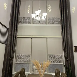 Laser Cut Shades with High Ceiling Drapes