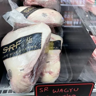 a display of raw chicken