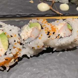 a sushi roll on a plate
