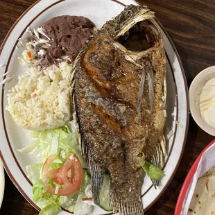 This fish has two sides so be sure to flip it over once you get all the meat on the first side
