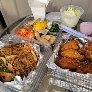 Japchae ( glass noodle dish) , korean bbq fried chicken and banchan