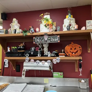 a shelf of halloween decorations