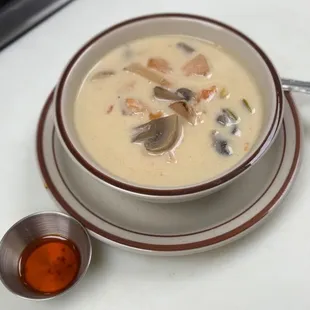 Tom Kha Gai soup. Coconut milk, galangal, mushroom, tomato, and chicken. Gluten-free and dairy-free.