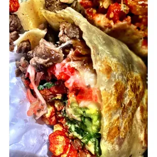 Hot Cheetos Steak Burrito.   Su Taqueria Thaly's . Late Night Stop. Great Food Super Service! Never Disappointed!  Pickup Delivery! Cool!