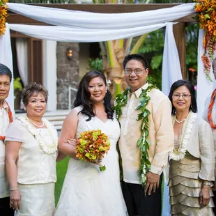 Flowers, fabric, leis for our parents and my bouquet all done by Su-V!