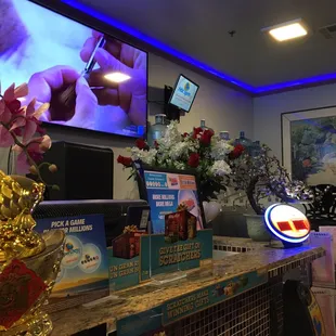 a tv and a desk in a room