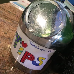 It a widdle garbage can!!! I'm throwing away money!