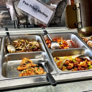 Pan fried whole shrimp, Mongolian beef, orange chicken and beef with broccoli