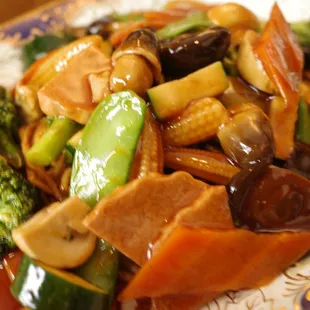 a plate of stir fried vegetables