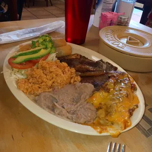 Enchilada chop 2 flautas and rice and beans