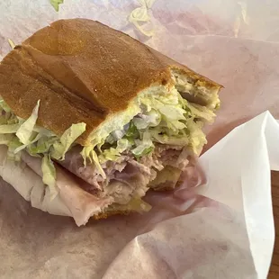 a sub sandwich in a wrapper