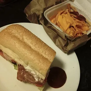 Sub brother sub (3 meat) and cheese fries.