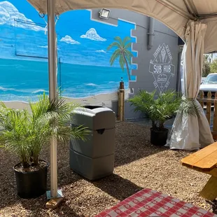 Outdoor seating cute beach mural