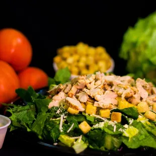 Chicken Caesar Salad (Croutons, Grilled Chicken, Parmesan Cheese, and Your Choice of Toppings)