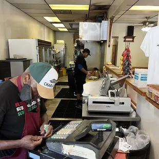 a man working at a cash register