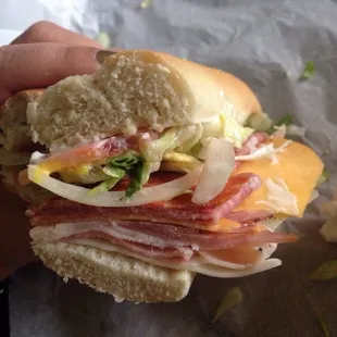 The Destroyer $10 for a whole. Everything's in there. Tons of meat and cheese. This ain't Bunk's. This is a legit, old school sub sandwich.