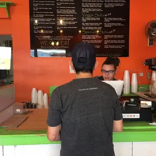 a man and a woman at the counter