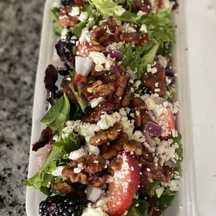 Such a surprise I adore this salad!!! and the strawberry vinaigrette it comes with is freakin delicious!!