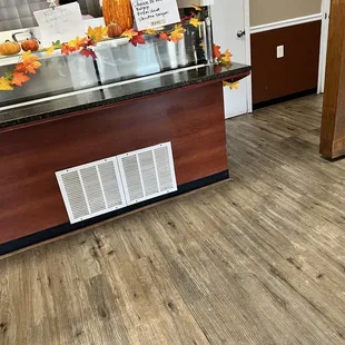 a view of a kitchen counter with a sign on it