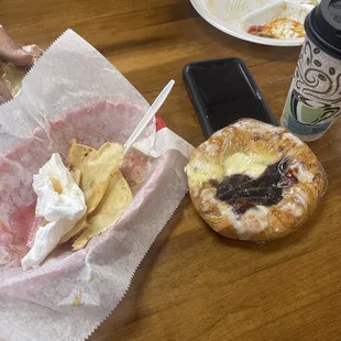 Remains of a delicious breakfast burrito (subbed with Turkey bacon) &amp; veggie omelette with Turkey bacon side and breakfast potatoes