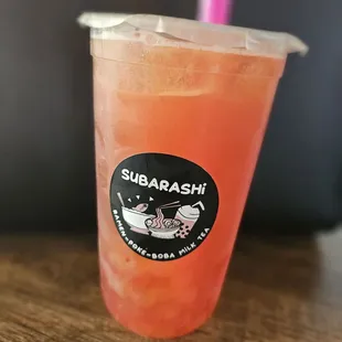 Strawberry mango fruit tea with strawberry and mango popping pearls