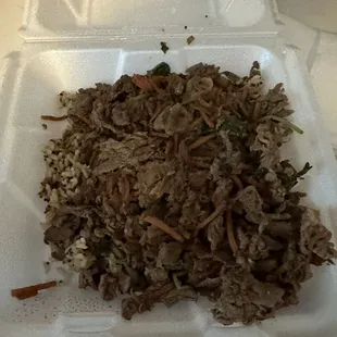 Burned meat and about three veggies cooked to death